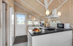 Η κουζίνα ή μικρή κουζίνα στο Holiday Home Bakkedraget Slagelse V