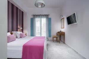 Letto o letti in una camera di Santellini Hotel