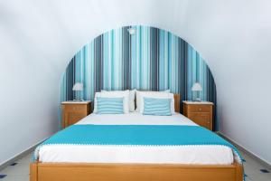 Letto o letti in una camera di Santellini Hotel