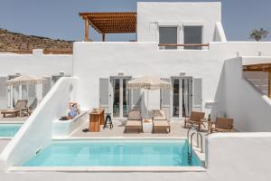 a view of the pool and the house at Ariadne's Crown Luxury AstroConcept Suites with Private Pools and Spas in Vívlos