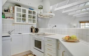 Η κουζίνα ή μικρή κουζίνα στο Holiday Home Sandersvig Strandvej Haderslev Xi