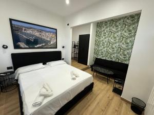 Postel nebo postele na pokoji v ubytování B&B Villa Nunzia