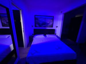 Postel nebo postele na pokoji v ubytování B&B Villa Nunzia