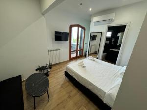Postel nebo postele na pokoji v ubytování B&B Villa Nunzia