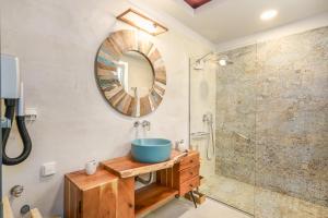 a bathroom with a sink and a shower at New Seaview Villa Minoiko with Private Pool near the Beach in Plakias in Sellía