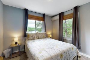Ένα ή περισσότερα κρεβάτια σε δωμάτιο στο Rockview Road Retreat