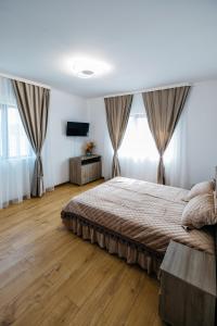 Postel nebo postele na pokoji v ubytování Casa Bala SMN