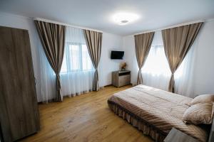Postel nebo postele na pokoji v ubytování Casa Bala SMN
