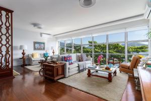Гостиная зона в Apartamento vista mar e vista pão de açúcar
