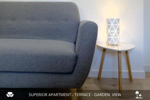 Posezení v ubytování Homey Experience - Design Apartments