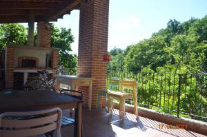 Balkón alebo terasa v ubytovaní B&B Cascina Bedria