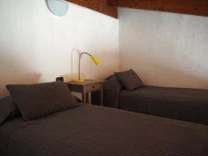 Posteľ alebo postele v izbe v ubytovaní B&B Cascina Bedria