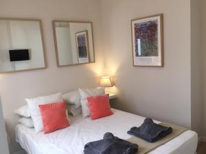 Cama o camas de una habitación en Apartamentos Uncibay Premium