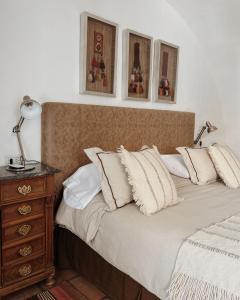 Ένα ή περισσότερα κρεβάτια σε δωμάτιο στο El Cortijo Hotel Boutique +55 φωτογραφίες