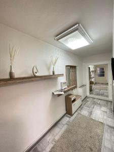 a living room with a skylight on the wall at Casa Antic Große Moderne 45qm wohnung im Zentrum Am Bahnhof Kostenloses WLAN in Saalfeld