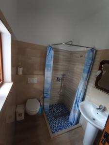 Koupelna v ubytování Beta Holidays