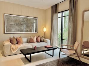 a living room with a white couch and a table at Toile Blanche in Saint Paul de Vence +82 photos