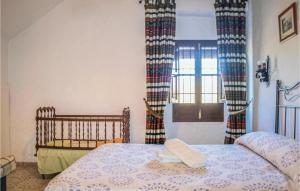 Posteľ alebo postele v izbe v ubytovaní Cozy Home In Villanueva Del Rosario