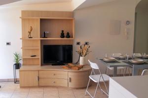 TV a/nebo společenská místnost v ubytování Casa Polgabe - Quadrilocale con vista - Assisi