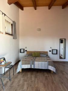 Posteľ alebo postele v izbe v ubytovaní B&B Cascina Bedria