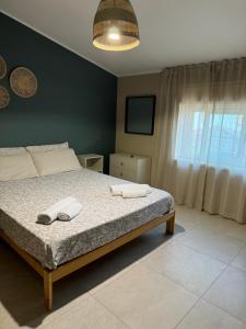 Ένα ή περισσότερα κρεβάτια σε δωμάτιο στο Marina sea home