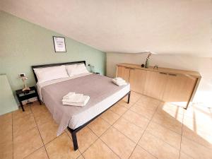 Postel nebo postele na pokoji v ubytování Casa Polgabe - Quadrilocale con vista - Assisi
