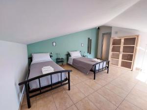 Postel nebo postele na pokoji v ubytování Casa Polgabe - Quadrilocale con vista - Assisi + 16 fotografií