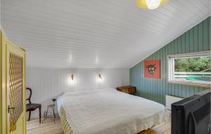 Ένα ή περισσότερα κρεβάτια σε δωμάτιο στο Amazing Home In Broager With Kitchen +17 φωτογραφίες