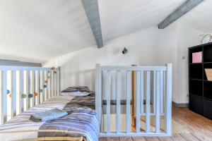 Postel nebo postele na pokoji v ubytování Le Queen - Wifi - Parking gratuit - Climatisation - Central - Tout équipée