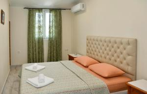 Postel nebo postele na pokoji v ubytování Vasilikis Sea House