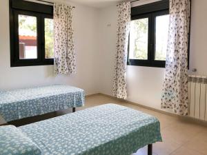 Fotografie z fotogalerie ubytování Cómoda e íntima Villa con piscina pricvada. 4 suites + 4 hab. + 2 baños v destinaci Lloret de Mar