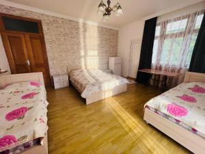 Letto o letti in una camera di Zuri Kvariati
