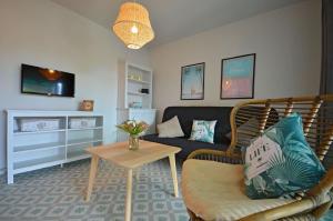Posedenie v ubytovaní Ferienwohnung in Costa Calma mit Terrasse, gemeinsamem Pool und Grill