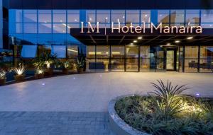 a large building with a sign that reads ihm hotel manaria at Manaíra Hotel in João Pessoa