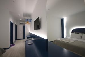 Voodi või voodid majutusasutuse Bay View Hotel toas