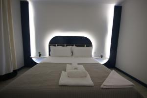 Voodi või voodid majutusasutuse Bay View Hotel toas