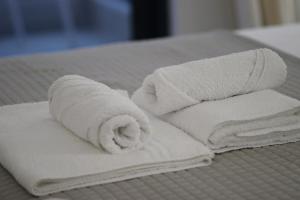 Voodi või voodid majutusasutuse Bay View Hotel toas