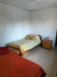 Postel nebo postele na pokoji v ubytování Don Galito casa en zona de bodegas y montaña + 10 fotografií