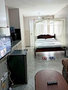 Postel nebo postele na pokoji v ubytování Maya Nest Lounge