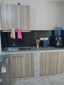 Kuchyň nebo kuchyňský kout v ubytování Maya Nest Lounge