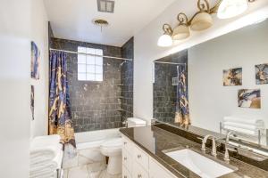 a bathroom with a sink and a toilet at Remote Texas Retreat Hot Tub, Deck, Grill! in Dalhart +30 photos