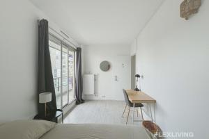 Ένα ή περισσότερα κρεβάτια σε δωμάτιο στο Flexliving - room - Mouchez