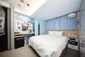 Katil atau katil-katil dalam bilik di Morwing Hotel - Culture Vogue