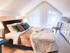 Postel nebo postele na pokoji v ubytování Design Maisonette - 24h Self-Check- GONDWANA Park - bis 7 Pers - In direkter Weihernähe - Parkplatz - WiFi - Balkon -Terrasse