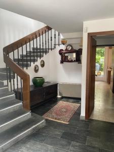 a staircase in a house with a green bowl on it at Affitti Brevi Liguria - Villa Gioia in Celle Ligure