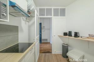 Kuchyň nebo kuchyňský kout v ubytování Flexliving - Room - Henri Sellier - Suresnes 92