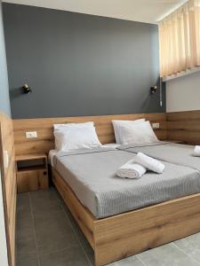 Postel nebo postele na pokoji v ubytování PROTERM apartments