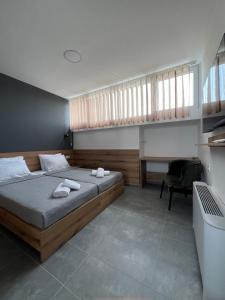 Postel nebo postele na pokoji v ubytování PROTERM apartments