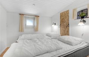 Postel nebo postele na pokoji v ubytování Two-Bedroom Holiday Home In Ostermarie