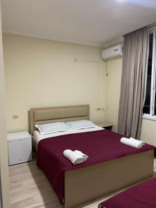 Voodi või voodid majutusasutuse Barakat Hotel toas